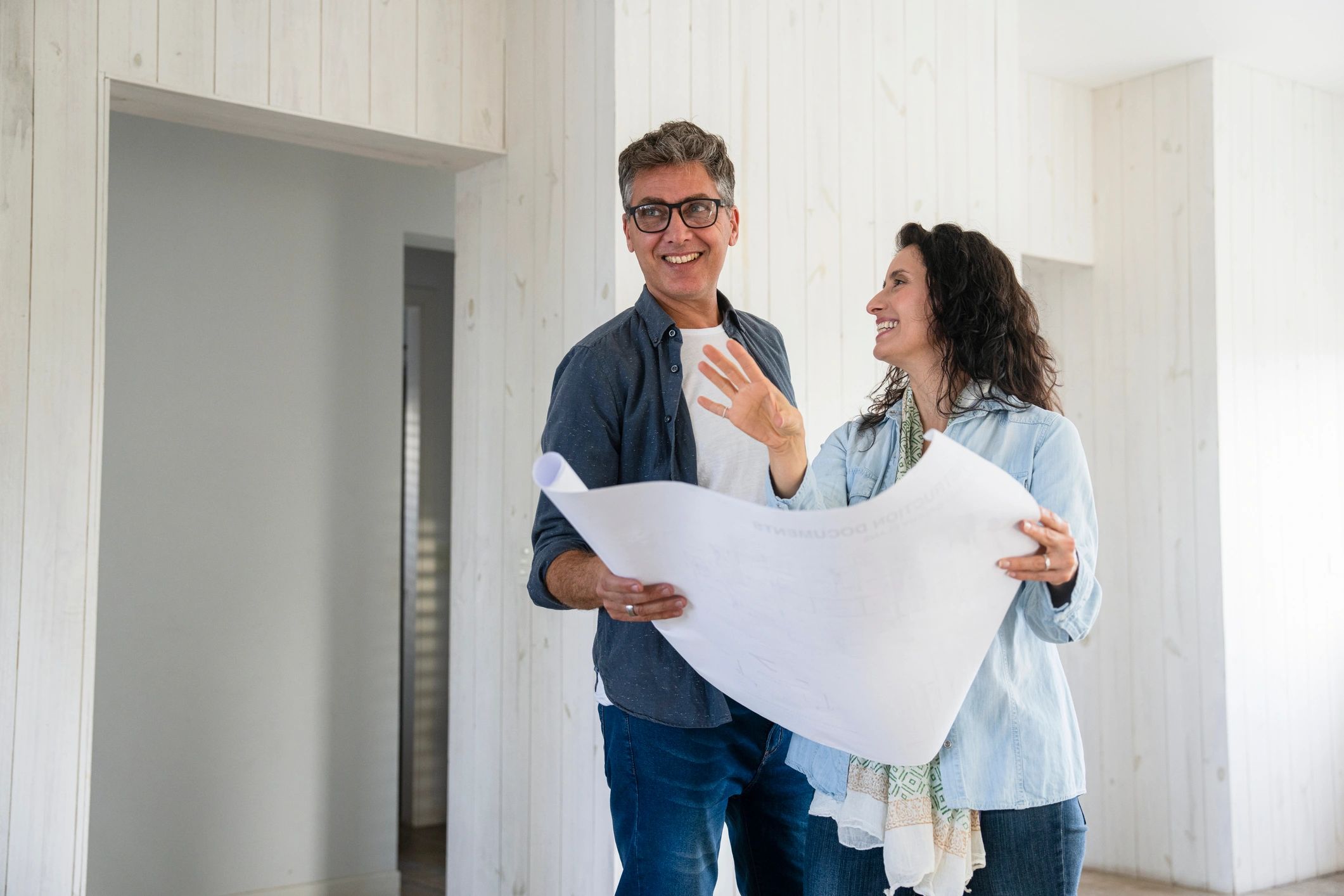 Homeowners planning a renovation together