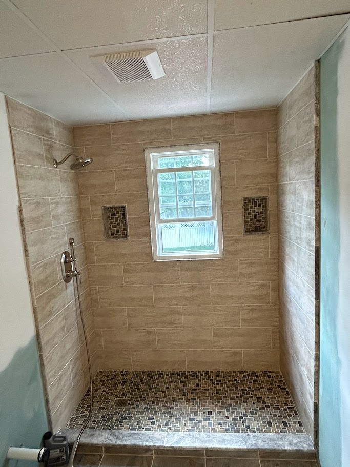 Kitchen flooring installation by JD Tile Kitchen & Bath Co.