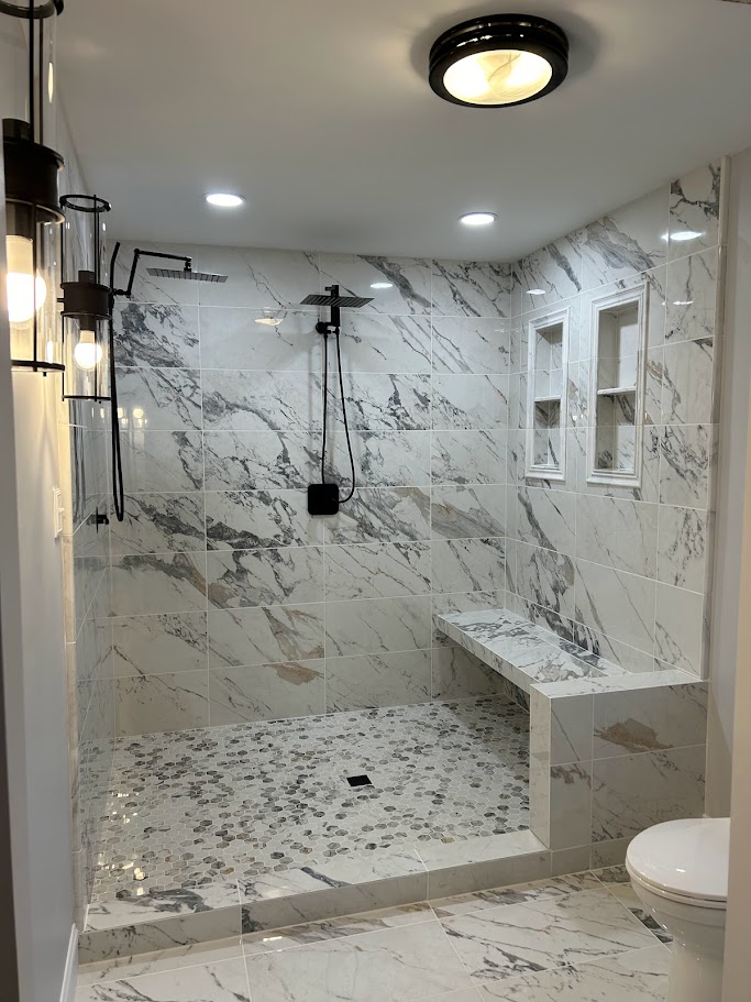 Flooring installation project by JD Tile Kitchen & Bath Co.